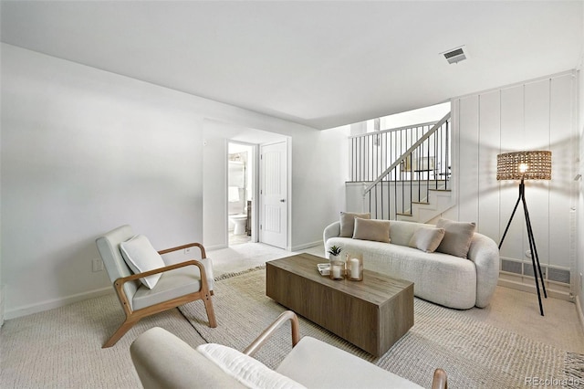 1380 Holly Dr E, Broomfield, CO 80020 - living room featuring light colored carpet and stairway