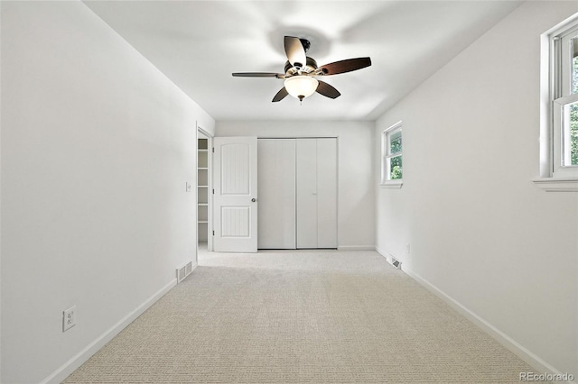 1380 Holly Dr E, Broomfield, CO 80020 - unfurnished bedroom with light carpet, a closet, and ceiling fan