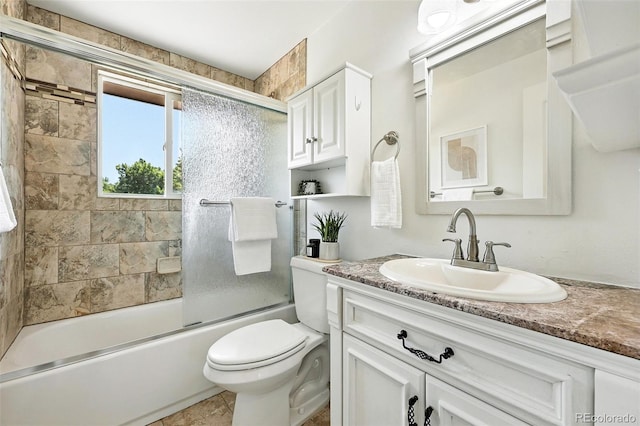 1380 Holly Dr E, Broomfield, CO 80020 - bathroom featuring vanity and bath / shower combo with glass door