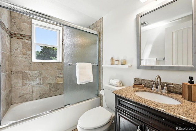1380 Holly Dr E, Broomfield, CO 80020 - bathroom featuring vanity and shower / bath combination with glass door