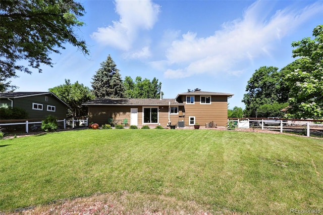 1380 Holly Dr E, Broomfield, CO 80020 - back of property with a fenced backyard