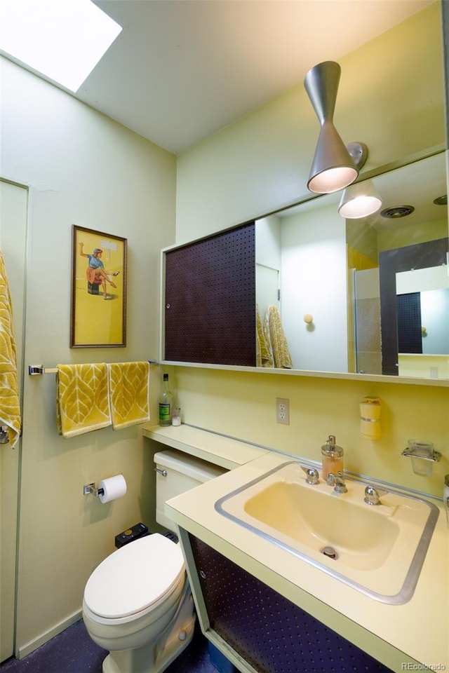 3650 Chimayo Rd, Littleton, CO 80123 - bathroom featuring vanity and a skylight