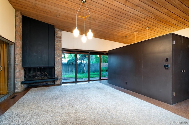 3650 Chimayo Rd, Littleton, CO 80123 - unfurnished living room with wood ceiling, lofted ceiling, and a fireplace