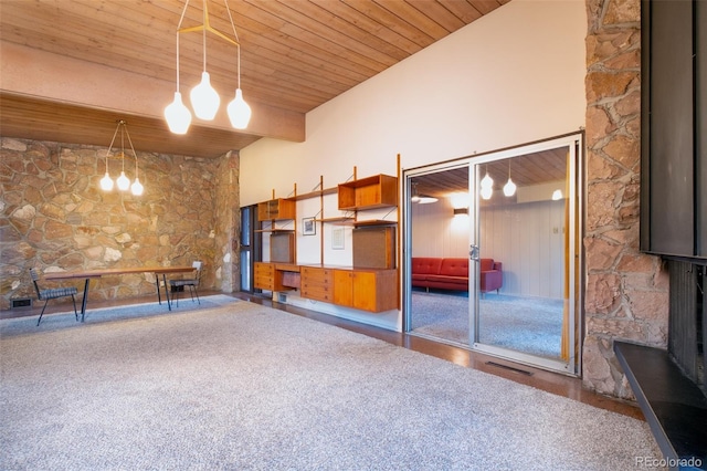3650 Chimayo Rd, Littleton, CO 80123 - below grade area featuring wood ceiling, wood finished floors, and a fireplace