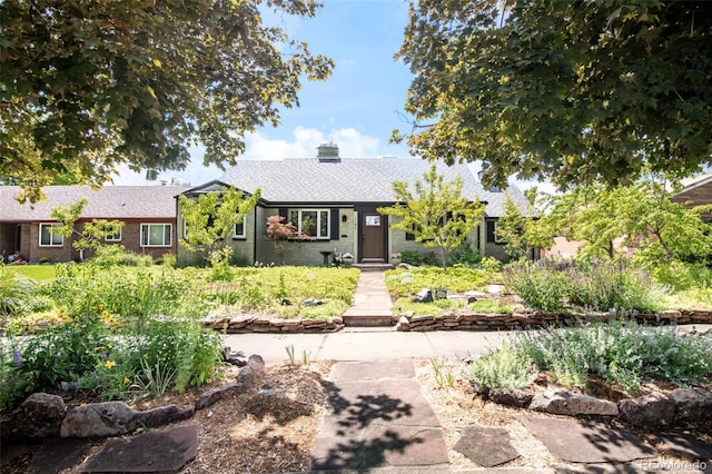 1185 Glencoe St, Denver, CO 80220 - ranch-style home with a chimney and a shingled roof