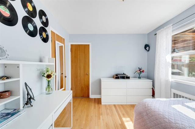 1185 Glencoe St, Denver, CO 80220 - bedroom with light wood-style floors and baseboards