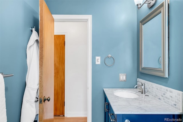 1185 Glencoe St, Denver, CO 80220 - bathroom featuring vanity and wood finished floors