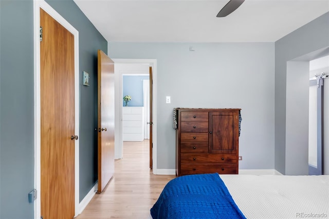 1185 Glencoe St, Denver, CO 80220 - bedroom with light wood-style flooring and ceiling fan