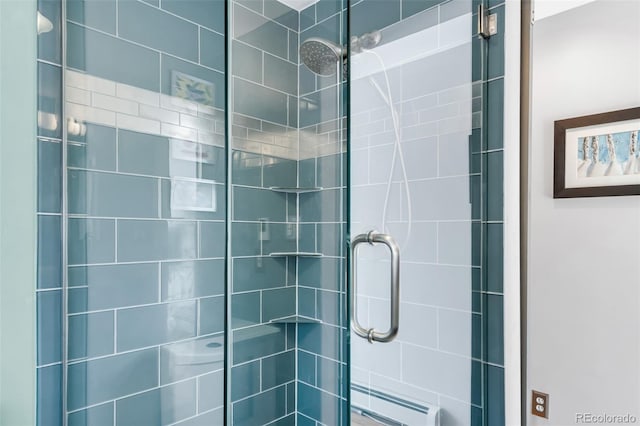 1185 Glencoe St, Denver, CO 80220 - full bath featuring a baseboard radiator and a shower stall
