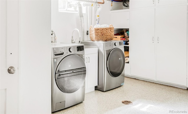 1185 Glencoe St, Denver, CO 80220 - laundry room featuring separate washer and dryer and cabinet space