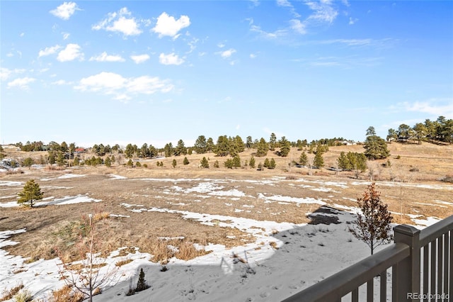 snowy view featuring a rural view