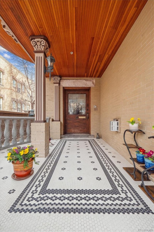 doorway to property with a wall mounted AC