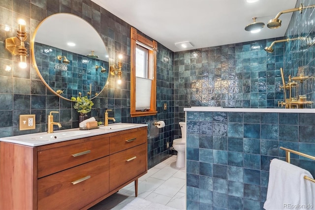 bathroom featuring a sink, tile walls, walk in shower, and double vanity