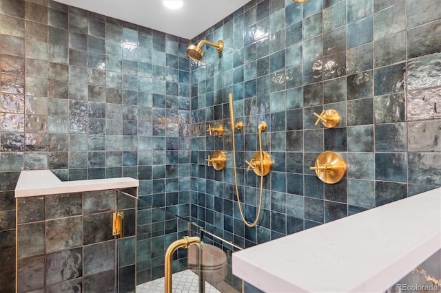 bathroom with recessed lighting, tile walls, and a tile shower