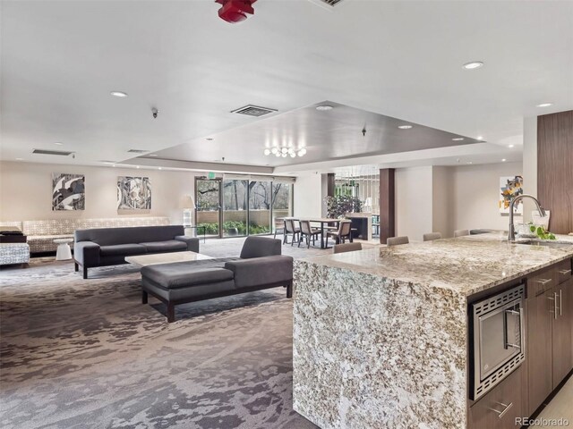800 N Pearl St Unit 1203, Denver, CO 80203 - common area featuring a sink and recessed lighting