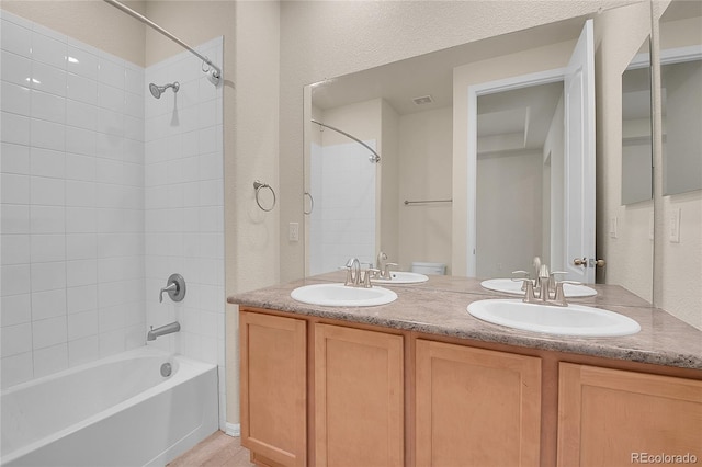 16076 Columbine Pl, Thornton, CO 80602 - full bath featuring shower / washtub combination, double vanity, and toilet