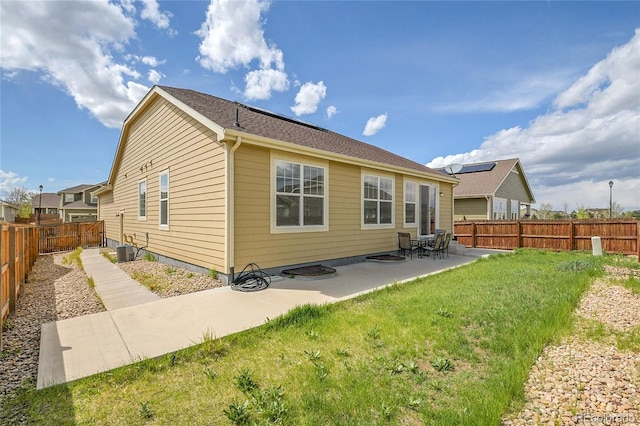 16076 Columbine Pl, Thornton, CO 80602 - rear view of house featuring a patio and central AC unit