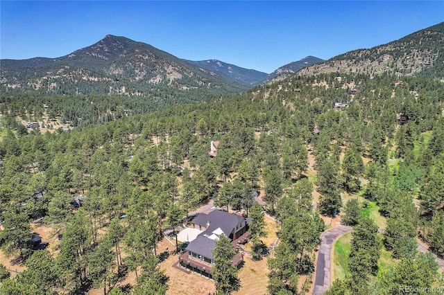 drone / aerial view featuring a mountain view