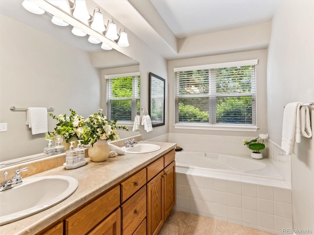1836 S Kendall Ct, Lakewood, CO 80232 - full bath featuring a bath, double vanity, and tile patterned flooring
