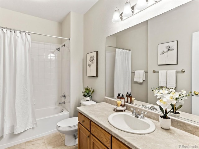 1836 S Kendall Ct, Lakewood, CO 80232 - full bath with vanity, toilet, shower / tub combo with curtain, and tile patterned floors