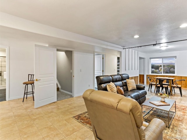 1836 S Kendall Ct, Lakewood, CO 80232 - living area featuring stairs, recessed lighting, and baseboards