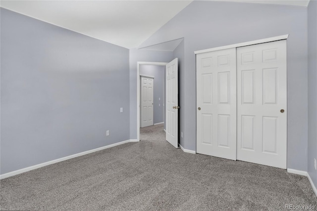 8651 Mallard Pl, Highlands Ranch, CO 80126 - unfurnished bedroom with vaulted ceiling, carpet flooring, and a closet