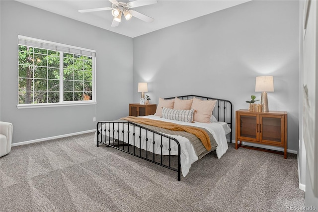 8651 Mallard Pl, Highlands Ranch, CO 80126 - carpeted bedroom featuring baseboards and a ceiling fan
