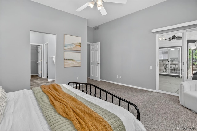 8651 Mallard Pl, Highlands Ranch, CO 80126 - carpeted bedroom featuring access to exterior, a ceiling fan, and a walk in closet