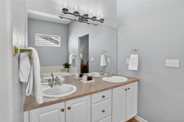 8651 Mallard Pl, Highlands Ranch, CO 80126 - full bath featuring double vanity and a garden tub