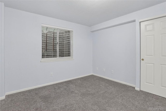 8651 Mallard Pl, Highlands Ranch, CO 80126 - carpeted empty room with baseboards