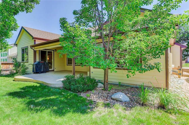 8651 Mallard Pl, Highlands Ranch, CO 80126 - rear view of property with a patio area