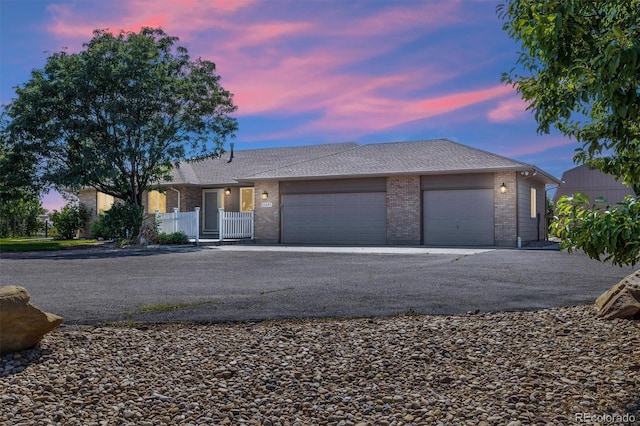 single story home featuring a garage