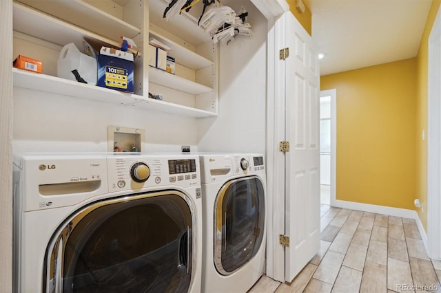 laundry room with washer and clothes dryer