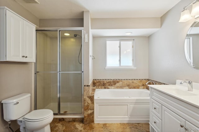 full bathroom with vanity, shower with separate bathtub, and toilet