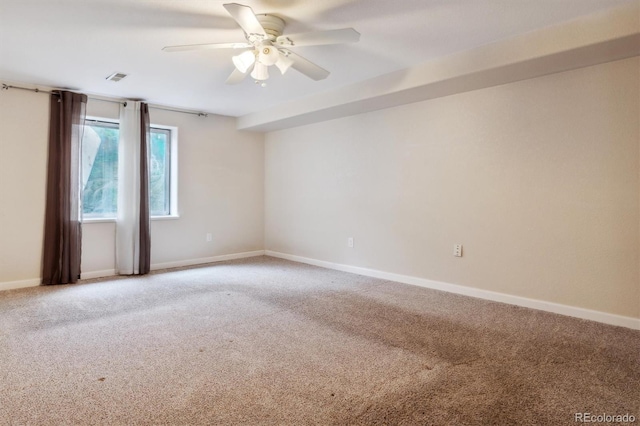 unfurnished room featuring carpet and ceiling fan