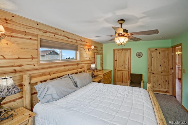 16395 Meadow Dr, Walsenburg, CO 81089 - bedroom with rustic walls, carpet, and a ceiling fan