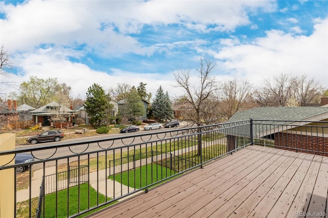 1653 S Logan St, Denver, CO 80210 - deck featuring a residential view and a lawn