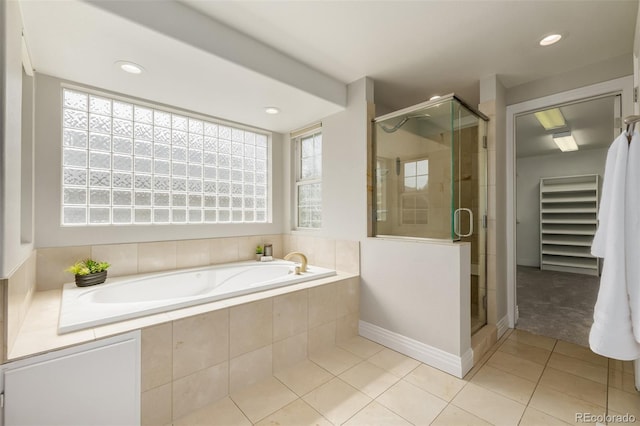 1653 S Logan St, Denver, CO 80210 - bathroom featuring tile patterned floors, a bath, a stall shower, plenty of natural light, and recessed lighting