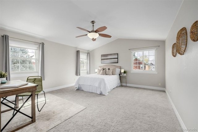 1653 S Logan St, Denver, CO 80210 - bedroom with multiple windows, vaulted ceiling, light carpet, an office area, and ceiling fan