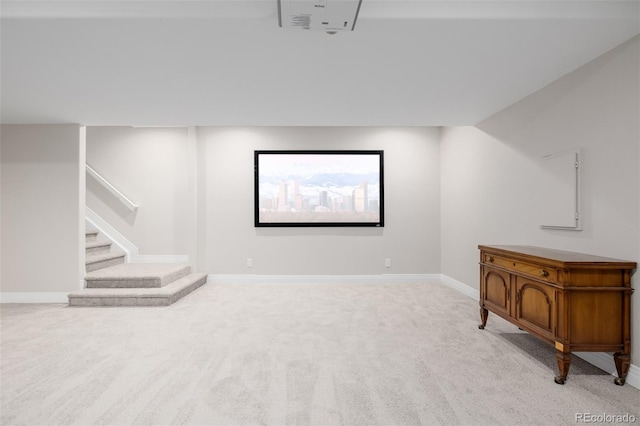 1653 S Logan St, Denver, CO 80210 - below grade area with light colored carpet and stairs