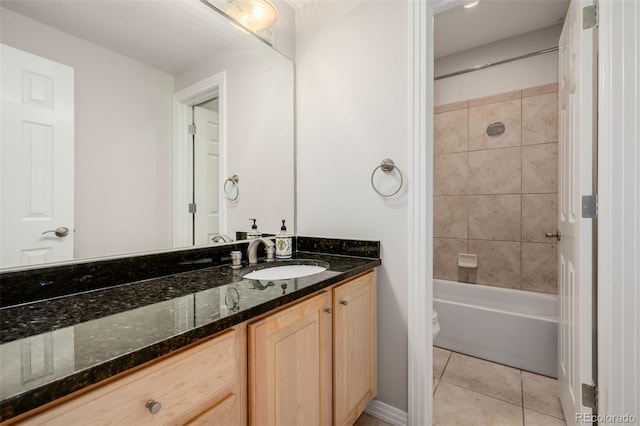 1653 S Logan St, Denver, CO 80210 - full bath featuring vanity, bathing tub / shower combination, and tile patterned floors
