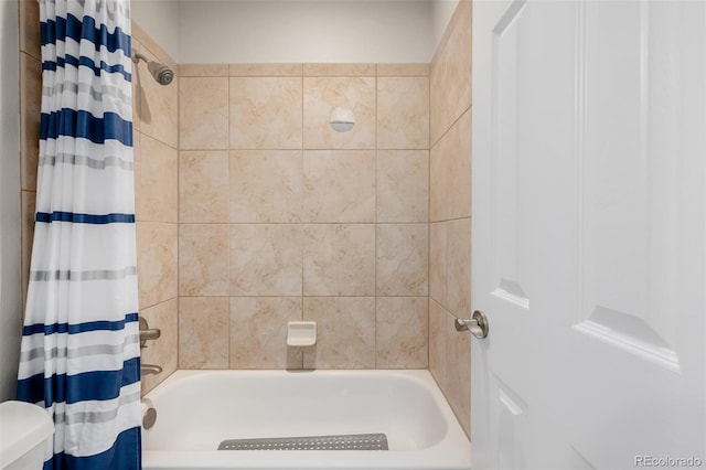 1653 S Logan St, Denver, CO 80210 - full bath featuring shower / bathtub combination with curtain and toilet