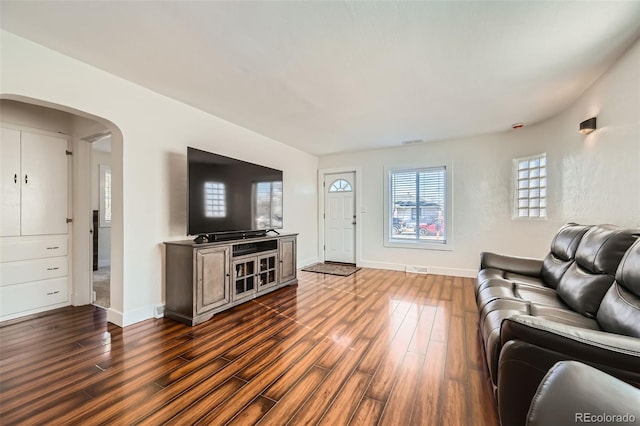 living room with dark wood-type flooring