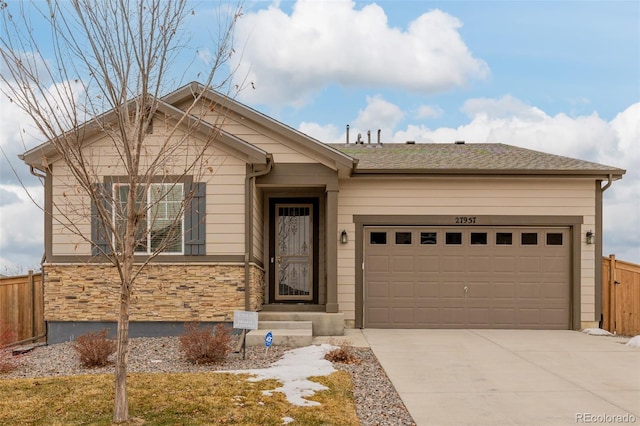 view of front of property featuring a garage