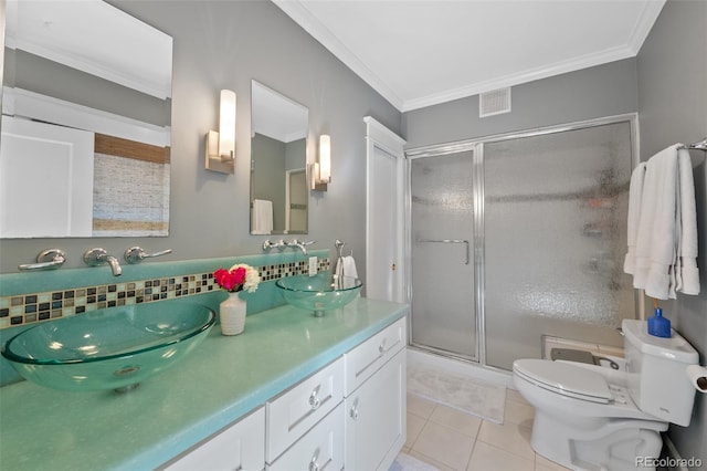 full bathroom with tile patterned flooring, a sink, visible vents, ornamental molding, and a shower stall