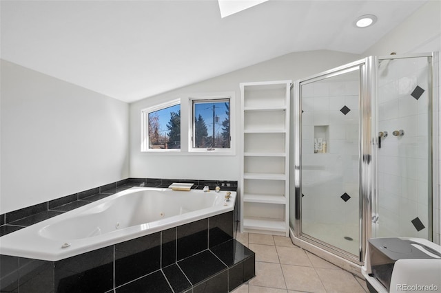 full bath with vaulted ceiling, a stall shower, a whirlpool tub, and tile patterned floors