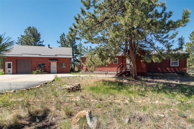 3126 Singletree Rd, Hartsel, CO 80449 - view of yard featuring concrete driveway and an attached garage