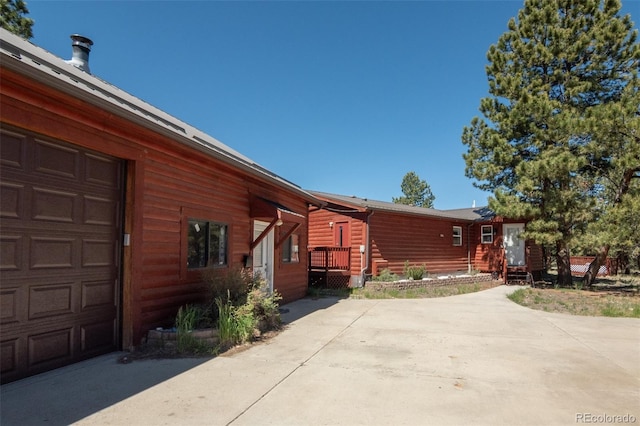 3126 Singletree Rd, Hartsel, CO 80449 - view of home's exterior featuring a garage and entry steps