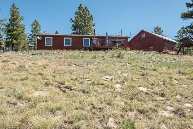 3126 Singletree Rd, Hartsel, CO 80449 - back of property with a wooden deck