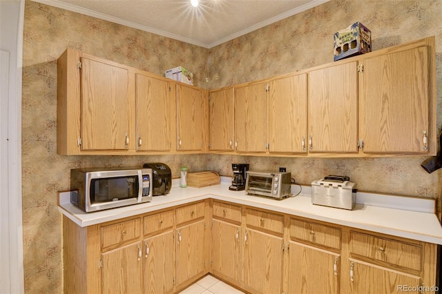 3126 Singletree Rd, Hartsel, CO 80449 - kitchen featuring stainless steel microwave, light countertops, wallpapered walls, ornamental molding, and light tile patterned flooring